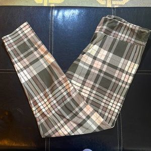 Gently worn pink and grey plaid leggings